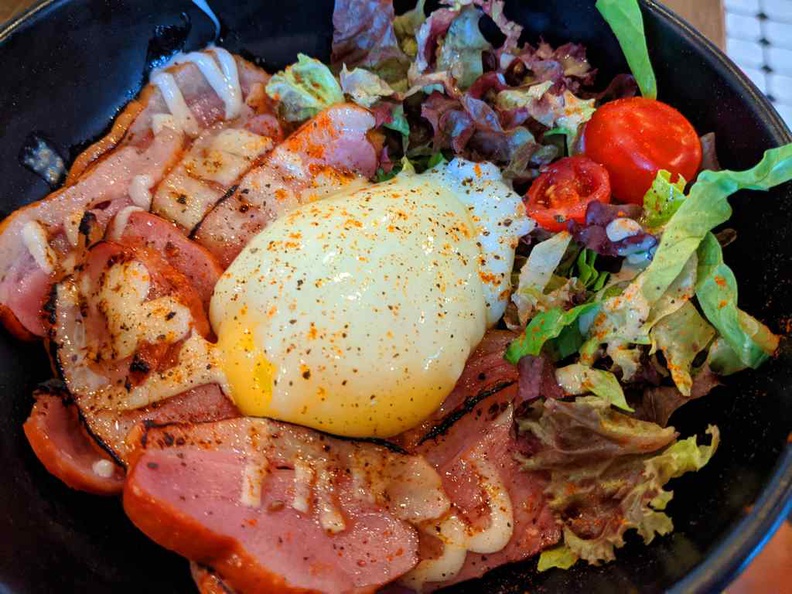 Smoked duck rice bowl with poached egg and sesame sauce ($15.90)