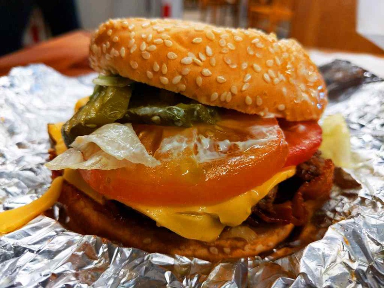 The little cheeseburger with fewer topping and a single patty. Tad like a "lite" cheeseburger