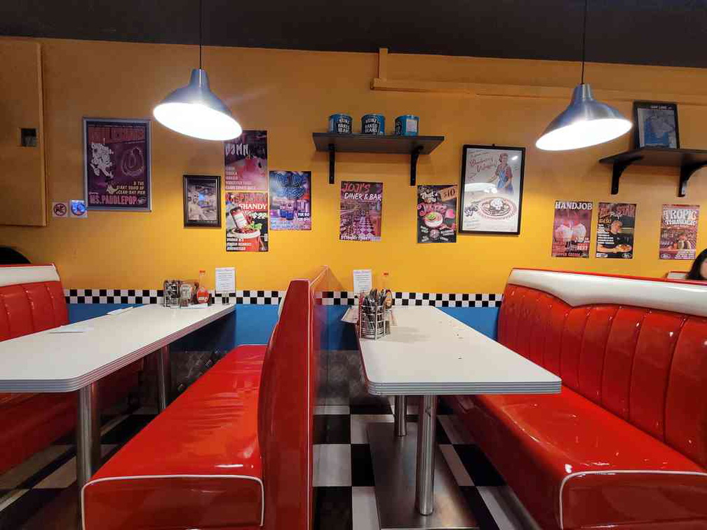 A neat and fresh retro seating within the restaurant interior. 