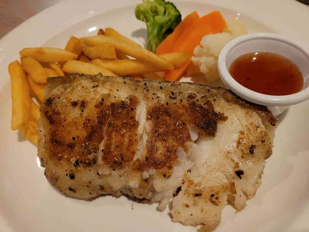 Baked cod dish ($29.90) with fries.