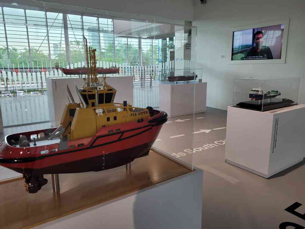 Detailed ship models of tugs, tankers and container ships.