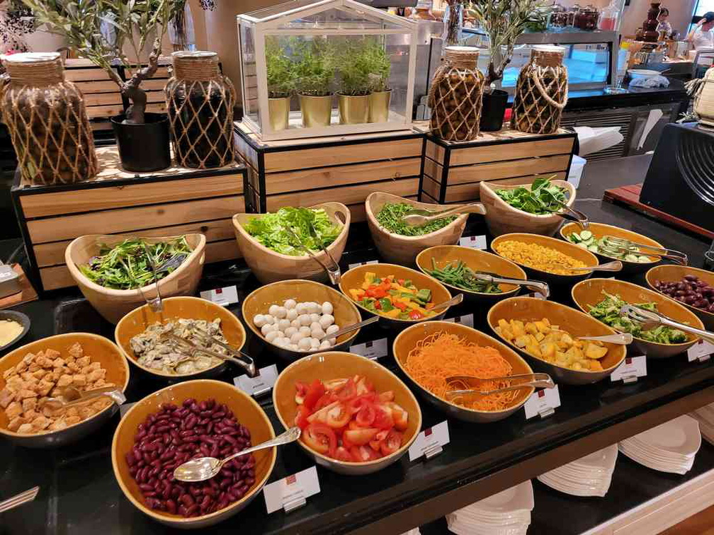 Salad bar, with a tad a mediterranean touch.