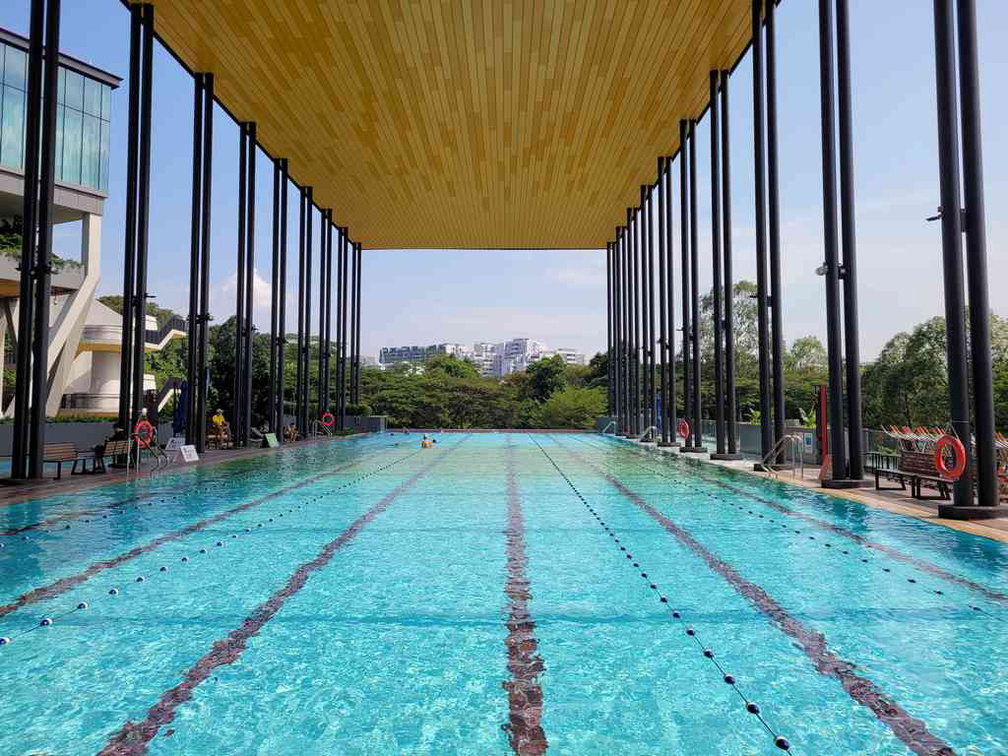 The covered pool at Choa Chu Kang has a clear edge wall and sheltered from the elements.