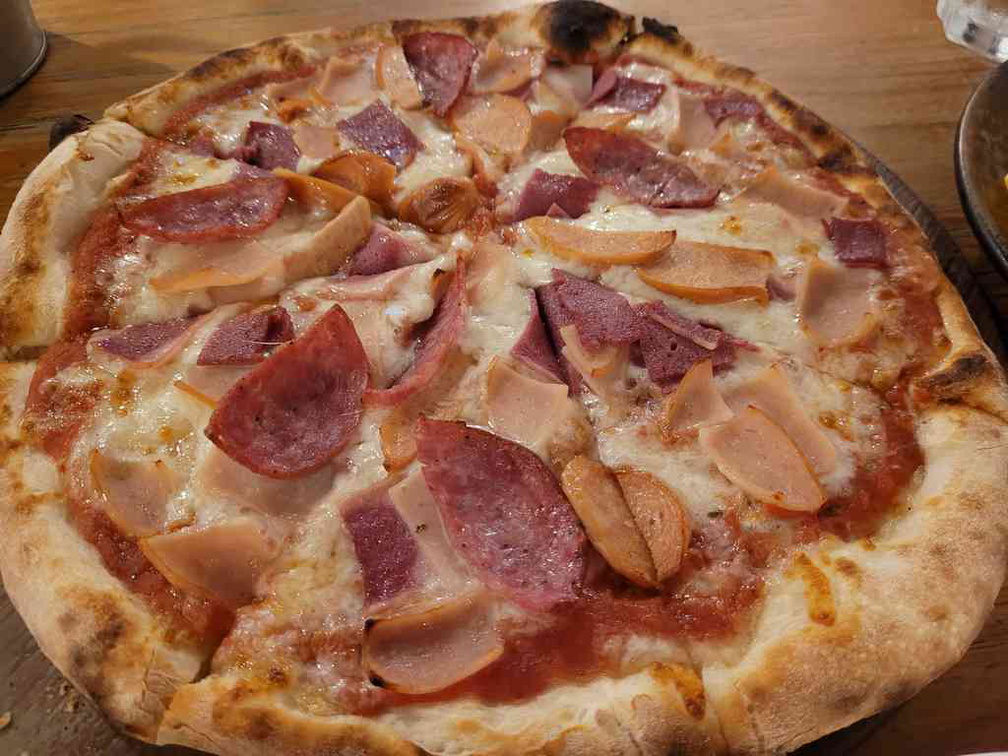 Squisito di Carne pizza ($24) is a meat lovers delight great for sharing.