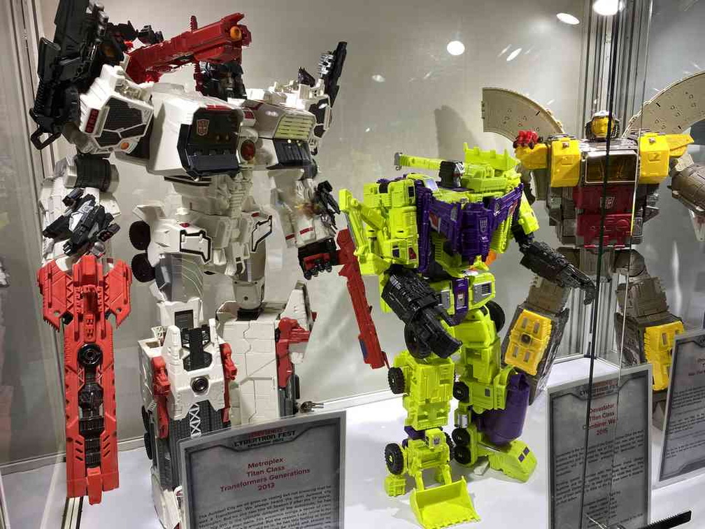 Collection of new and classic transformers toys.