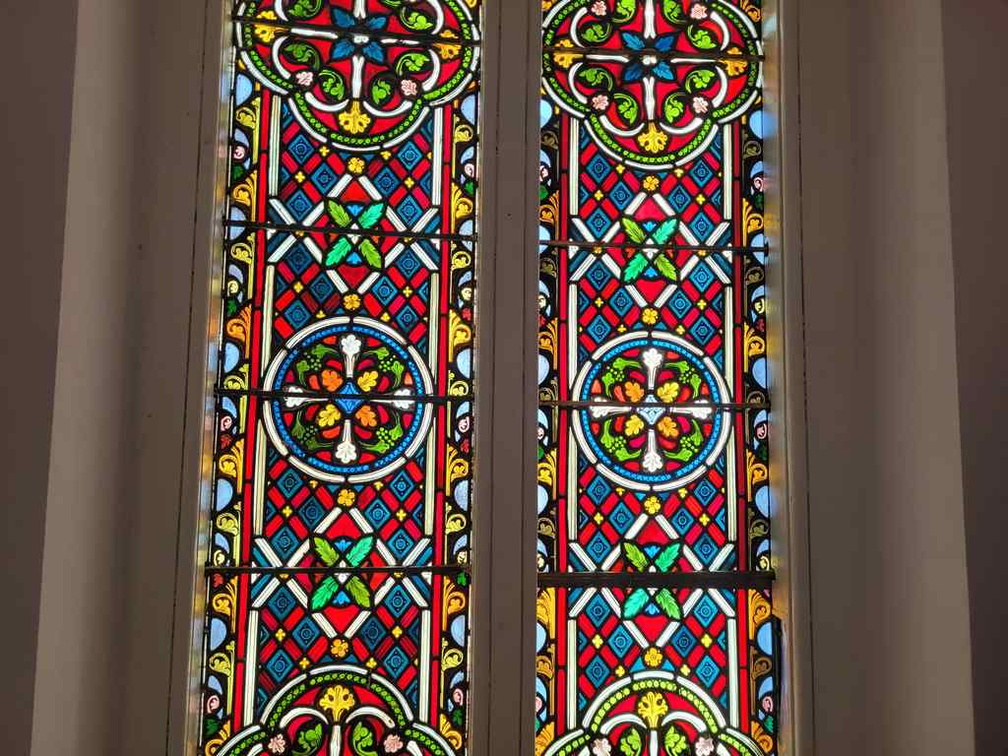 Stained glass floral patterns.