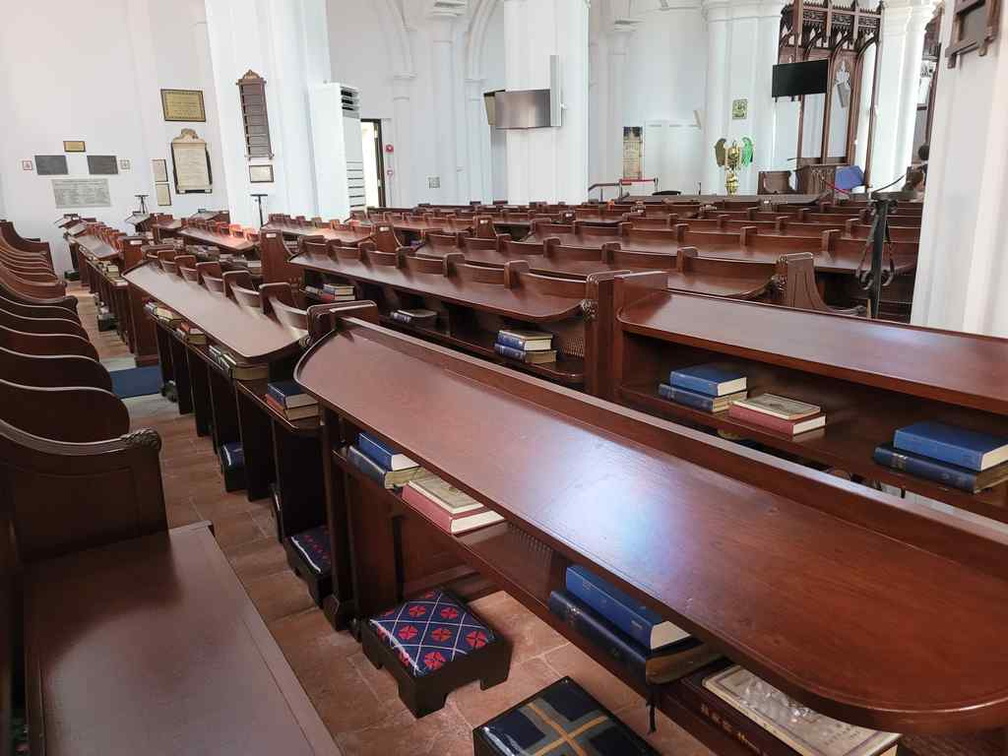 Seat pews with restored wood.