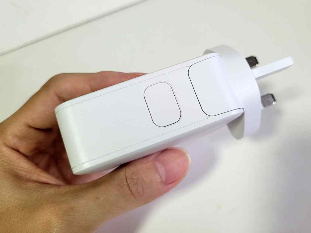 Wall plug release button Wall plug release button