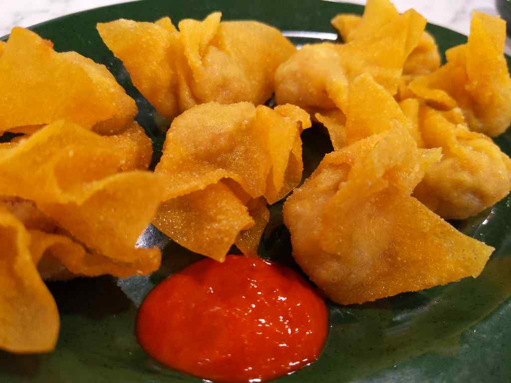 Fried wanton with their special chilli sauce