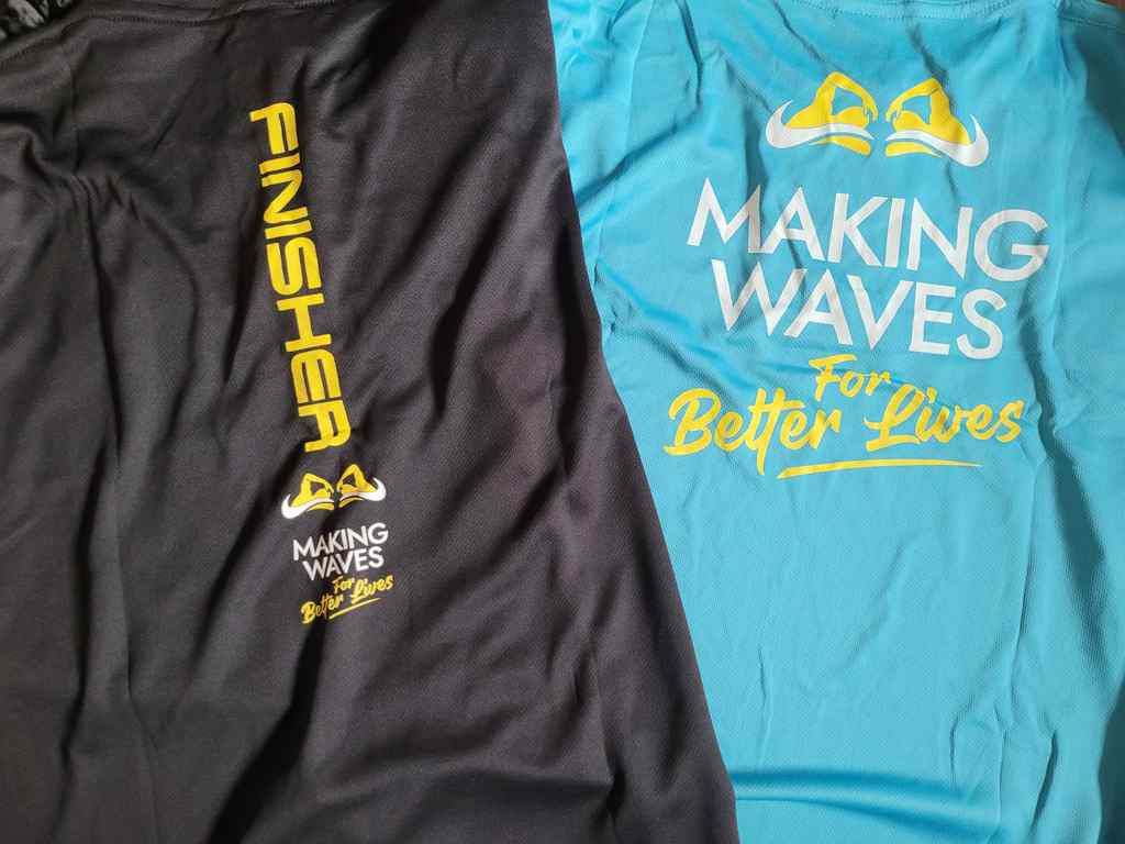 Event tee and Finisher's tee for the 55km swim event.